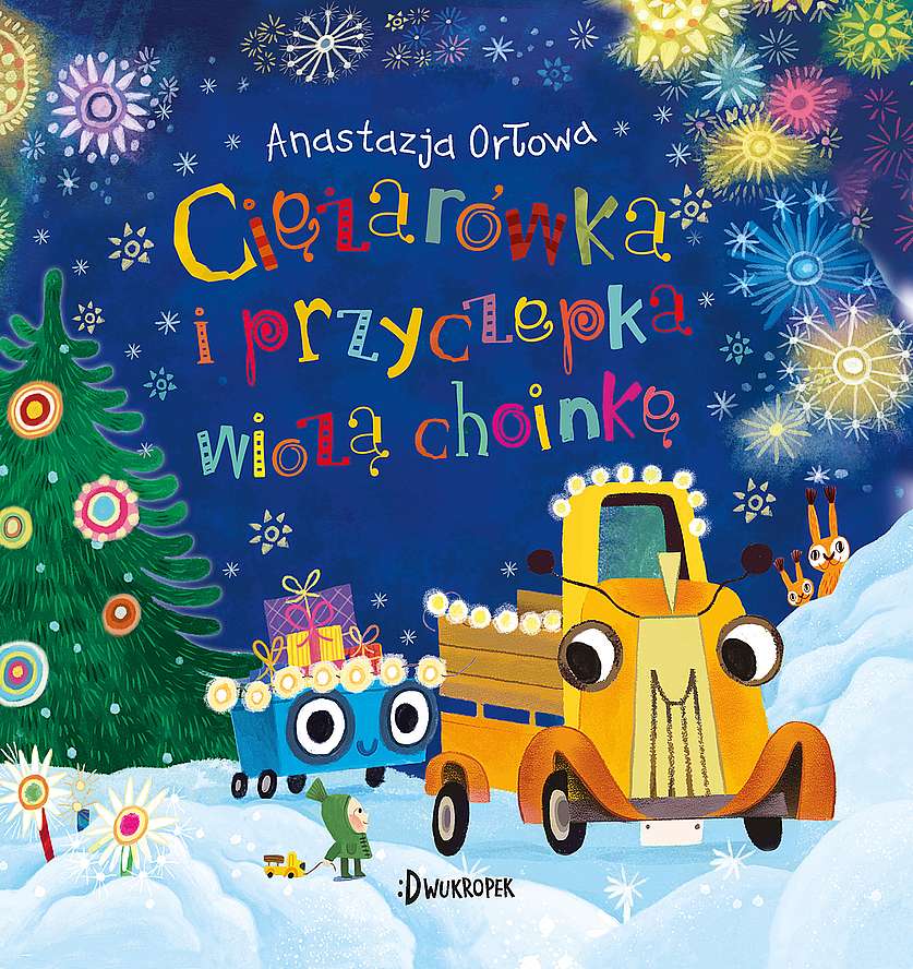 Ciężarówka i przyczepka wiozą choinkę