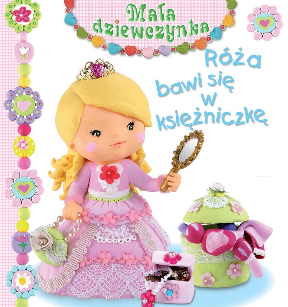 Mała dziewczynka róża bawi się w księżniczkę