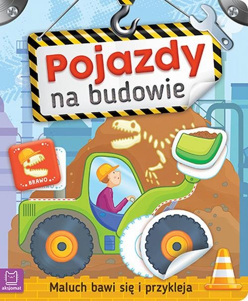 Maluch bawi się i przykleja Pojazdy na budowie