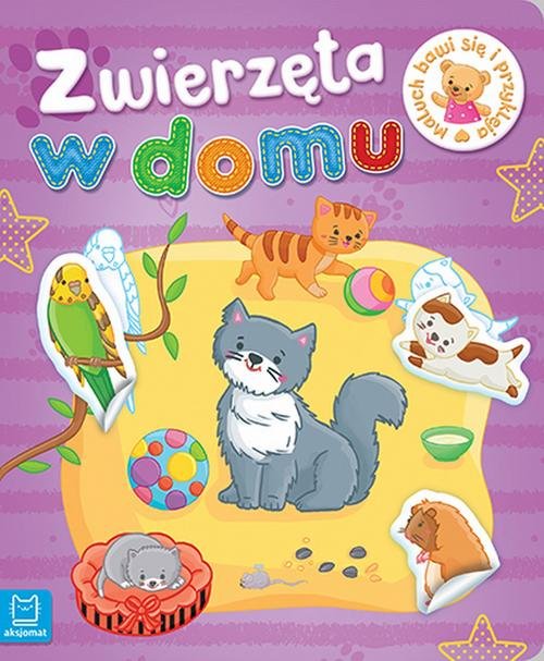 Maluch bawi się i przykleja Zwierzęta w domu